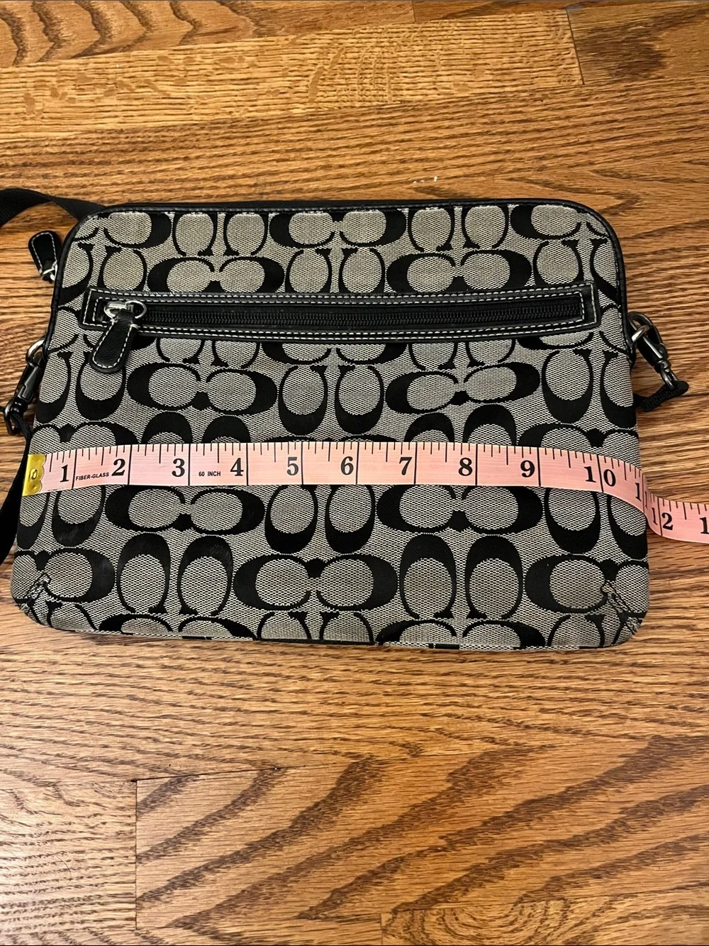 Coach signature monogram padded tablet case with a black stripe